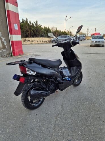 suret panel: Şəhər içi sürüş üçün praktik skuter - Rəng: qara - Kuzov tipi: skuter — 1