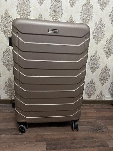 Gino Rossi sərt korpuslu çamadan - Rəng: qəhvəyi/bronza - Material lalafo.az -da Gino Rossi sərt korpuslu çamadan - Rəng: qəhvəyi/bronza - Material