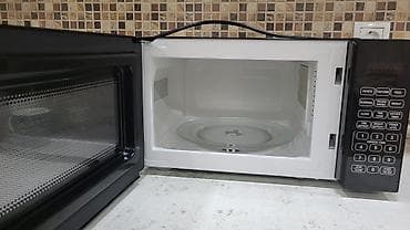 mikrodalğali soba: Mikrodalğalı soba Mikrodalğalar ilə, rəng - Qara, Yeni — 2