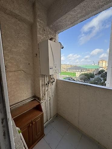 ev kiraye: Məkan: çoxmərtəbəli yaşayış binasında mənzil Təsvir: - Şəhər — 3
