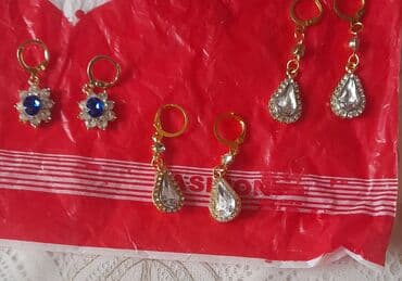 Qadın bəzək dəsti – üzük, sırğa və qolbaq Məhsul təsviri: - Qızılı