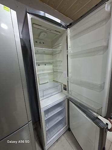 aristonlar: 2 qapılı Hotpoint Ariston Soyuducu Satılır, rəng - Gümüşü, Təkərli — 2