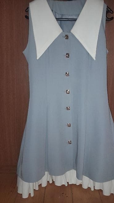 Məhsul: Qolsuz qadın donu - Rəng: Göy-boz əsas, ağ detallarla -