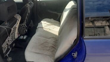 volkswagen jetta 1 4: Opel Astra F universal (kombi) – göy rəngli kuzov. Xüsusiyyətlər: - — 4