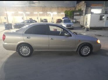 turbo az kuruz: Nissan Sunny sedan - Korpus: 4 qapılı sedan, qızılı/bej rəng - Kuzov — 4