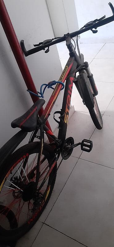 goran velosiped: STRIM brendli dağ velosipedi - Rəng: qara üzərində qırmızı-sarı — 3