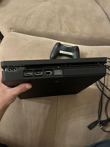 ps4 pro 2tb: PlayStation 4 Slim (qara) oyun konsolu Paketə daxildir: - PS4 Slim — 2