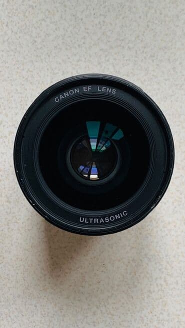 printer satisi islenmis: Canon EF 35mm f/1.4 L USM
Tam ishlek veziyetde, ciziqlari var — 9