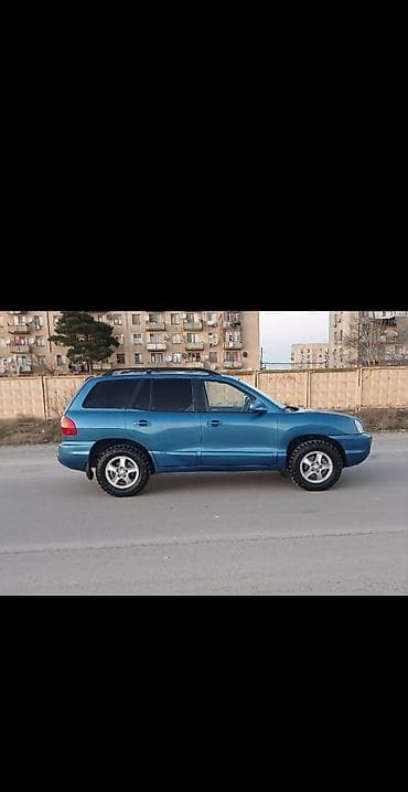 ij disklər: Hyundai Santa Fe – mavi rəngli, 5 qapılı SUV. Texniki və dizayn — 5