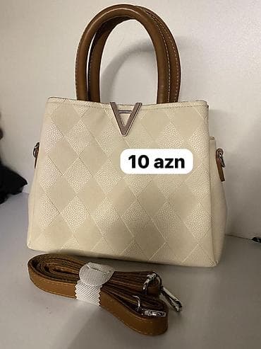 Qadın çantası - Rəng: krem gövdə, qəhvəyi tutacaqlar və uzun kəmər -