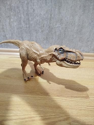 Динозавр игрушка