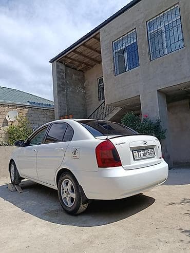 passat disk: Hyundai Accent (sedan), ağ rəng. Texniki xüsusiyyətlər və təchizat: - — 7