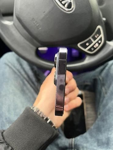 en ucuz soyuducu qiymetleri: IPhone 14 Pro, 128 GB, Deep Purple, Simsiz şarj — 4