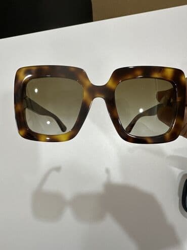 Audi: Gün eynəyi, Gucci — 2