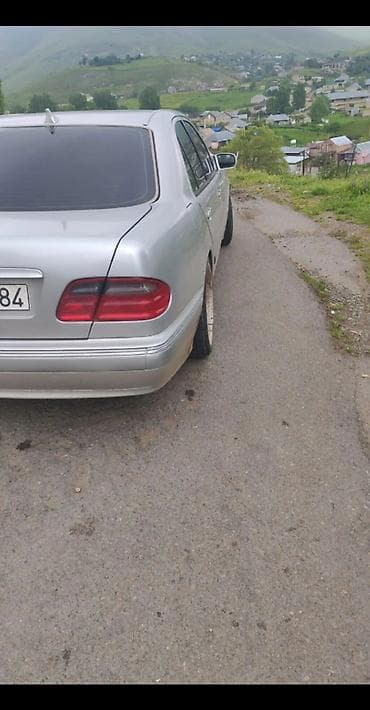 Продажа авто: Mercedes-Benz E-Class sedan (E200 Kompressor emblemli), gümüşü rəng — 9