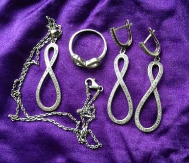 1 qram qizilin qiymeti: Dəstə daxildir: Üzük, Kulon, Sep, Gümüş, 925 Əyar — 1