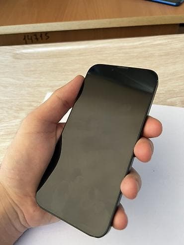 a 13 telefon: IPhone 16e, 128 GB, Qara, Zəmanət, Face ID — 3