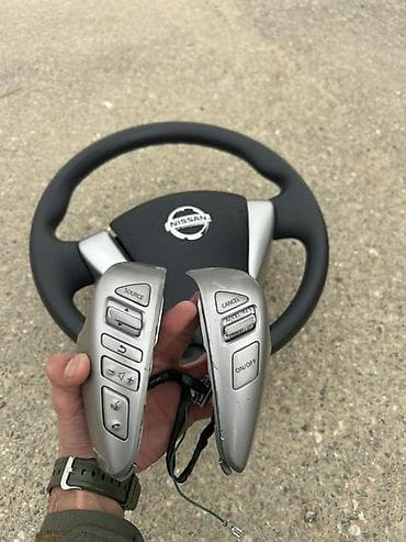 Düymələr: Nissan Nissan sükanda inteqrasiya olunan idarəetmə düymələri, Orijinal — 3