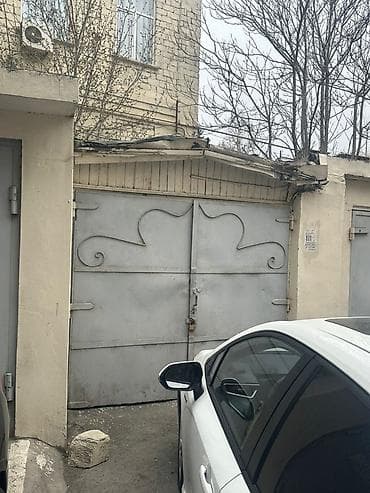 Гаражи: Qaraj/Anbar sahəsi - Kərpic konstruksiyalı, metal ikiqat darvazalı — 1