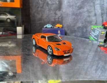metbex tavan modelleri: Коллекционная модель Opel Speedster orange 2000 DeAgostini Art  — 4