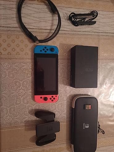 Nintendo Switch V2. Ideal veziyyetde, hec bir problemi yoxdu, cızığı
