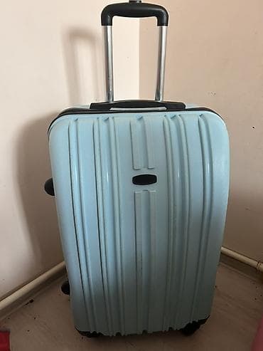 Səyahət üçün iki ədəd trolley çemodan dəsti 1) Sərt gövdəli çemodan -