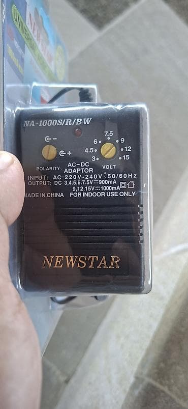 3v adapter: NEWSTAR Universal AC/DC Adapter – NA-1000S/R/BW - Giriş: AC 220–240V — 1
