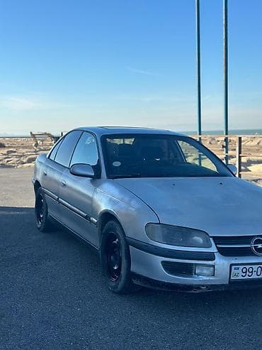 kia optima 2012: Opel Omega: 2 l | 1999 il Sedan — 8