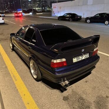 bmw 3 серия 318 at: BMW 3 Series E36 sedan – dərin mavi rəngli, idman üslubunda tüninq — 7