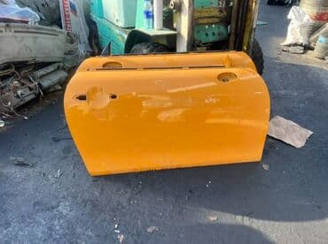 on suse: Narıncı rəngdə olan Mini Cooper avtomobil qapısı. Qapı dəstəyi və — 2