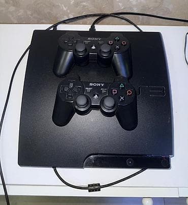 sony a6600: PlayStation 3 (PS3) Slim oyun konsolu, 2 dene original DualShock — 1