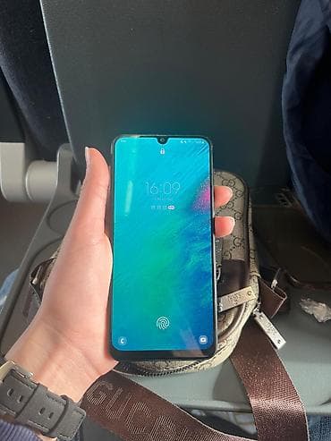 Samsung Galaxy A50, 64 ГБ, цвет - Черный, Отпечаток пальца