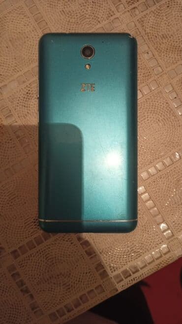 fly evo 4 телефон: ZTE v889m, 512 ГБ, цвет - Синий, Сенсорный — 1