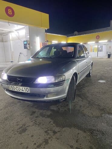 Opel Vectra sedan - Kuzov: 4 qapılı sedan, gümüşü rəng, qara kapotla