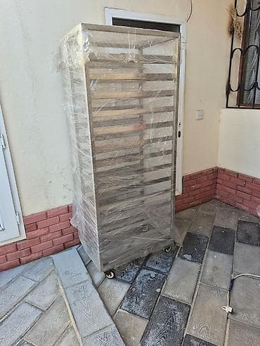 Mağaza avadanlığı: Paslanmayan metaldan hazırlanmış, çoxsaylı qəfəsləri olan, təkərli — 1