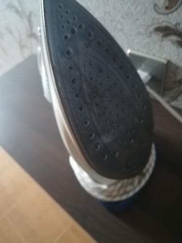 uz alan aparat: Tefal ütü. demək olar təzədir. xirda defekti var üstünde — 2