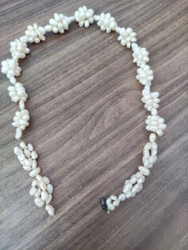 tək qaş: Boyunbağı — 1