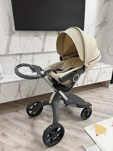 купить детскую коляску бу: Stokke brendi. 2300 azn alinib yeni kimi qalib. Tutacaqi yuxarida — 2