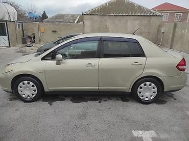 nissan tiida qiyməti: Nissan Tiida: 1.6 l | 2005 il Sedan — 2