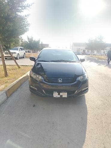 mikroavtobus satisi: Honda Insight Hybrid – 5 qapılı hetçbek, qara rəng. - Yapon hibrid — 1