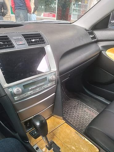 vaz2107 satisi: Toyota Camry – sedan Xüsusiyyətlər: - Kuzov: qara rəng, 4 qapı, sedan — 4