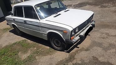 mator 80cc vəlo: VAZ 2106, ağ rəngli sedan. Texniki xüsusiyyətlər: - Kuzov: sedan — 2
