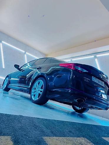 maşın logoları: Kia Optima: 2 l | 2013 il Sedan — 1