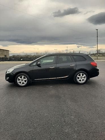 sükan lenti: Opel Astra: 1.4 l | 2011 il 188000 km Universal — 4