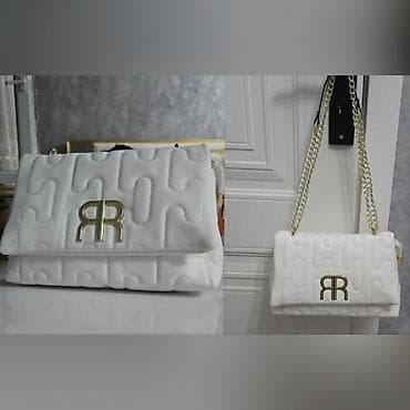 Çox keyfiyyetli ag çanta.1 eded qalib.Ölçüsü 27×18