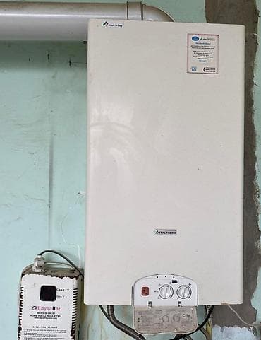Kombi Italterm 30 kw ideal veziyyetde hal hazirda iwleyir gelib baxa