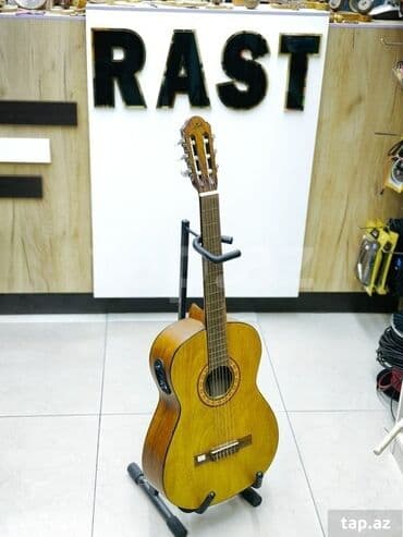 Musiqi alətləri: Klassik gitara, Yeni, Ünvandan götürmə — 1