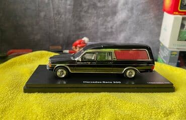 metbex tavan modelleri: Коллекционная модель Mercedes-Benz 200 W123 Hearse black 1982 Schuco — 26