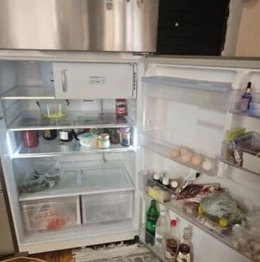 2ci əl qaz peçi: İkiqat qapılı, üstdən donduruculu inox (paslanmayan polad rəng) — 2