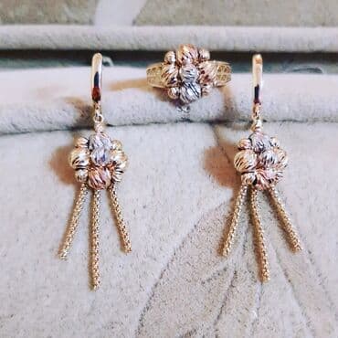 italyan qizili: Dəstə daxildir: Boyunbağı, Kulon, Sep, Pandora, Sarı qızıl, 585 Əyar, 13900 g — 6